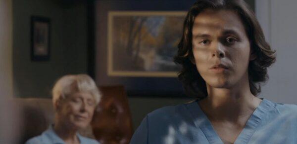 Chris (Tate Dewey) begins to reconsider his selfish outlook as he visits the hospital with his grandmother Melody (Karen Grassle), in “Not to Forget.” (Vertical Entertainment)