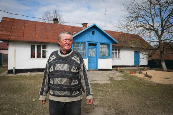 Myhailo Romanyshyn in his back yard in Koty, Ukraine, on March 25, 2022. (Charlotte Cuthbertson/The Epoch Times)