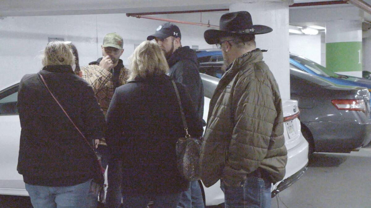 Enrique Tarrio, Chairman of the Proud Boys, and Stewart Rhodes, founder of the Oath Keepers, in a garage in Washington, in a still image taken from a Jan. 5, 2021, video. (Saboteur Media/Handout via Reuters)
