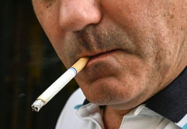 A man smoking a cigarette in Washington, D.C. on Sept. 12, 2019. (Eva Hambach/AFP via Getty Images)