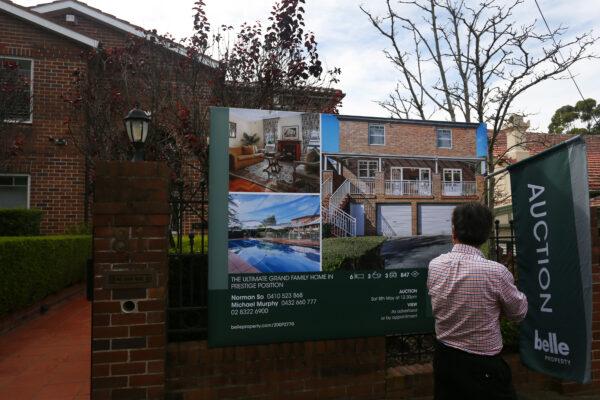 A prospective buyer attends an auction of a residential property in the suburb of Strathfield in Sydney, Australia, on May 8, 2021. (Lisa Maree Williams/Getty Images)