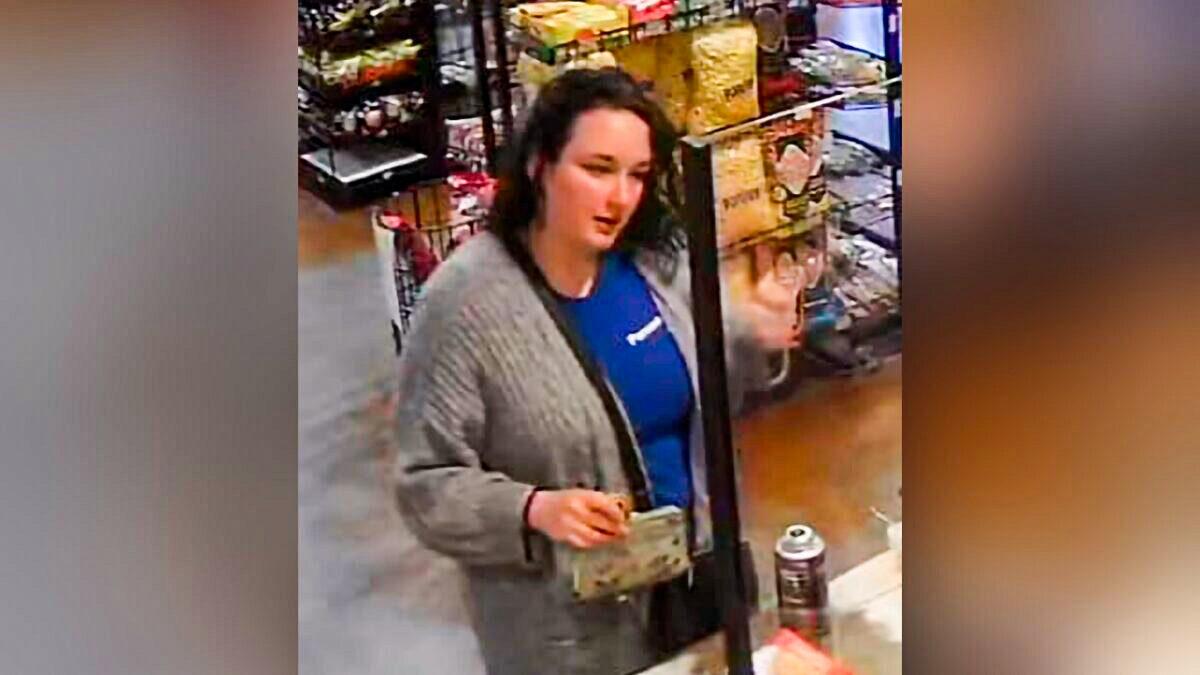 Naomi Irion, 18, of Fernley, Nev., makes a purchase shortly before authorities say she disappeared before dawn, on March 12, 2022. (Lyon County Sheriff's Office via AP)