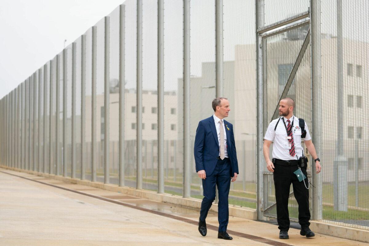 UK Justice Secretary Dominic Raab with a prison officer at the opening of category C prison HMP Five Wells in Wellingborough, United Kingdom, in an undated file photo. (Joe Giddens/PA)