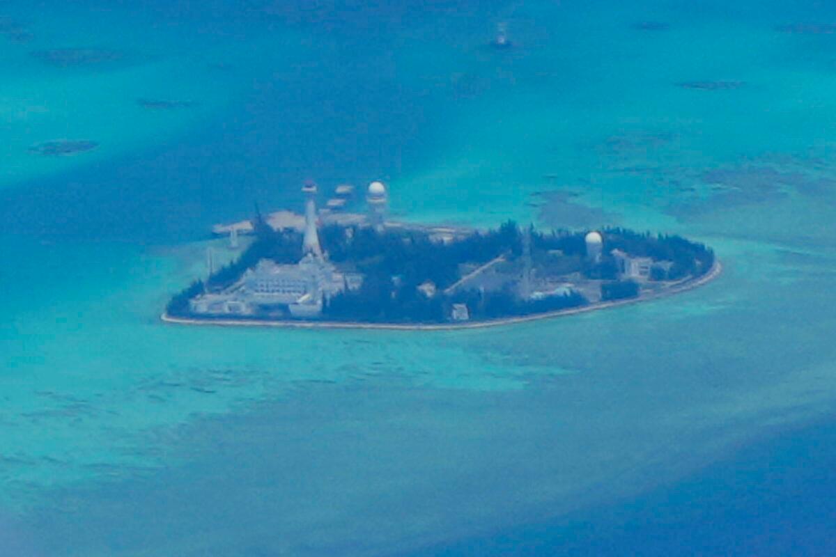 Chinese structures and buildings at the man-made island on Johnson reef at the Spratlys group of islands in the South China Sea on March 20, 2022. (Aaron Favila/AP Photo)