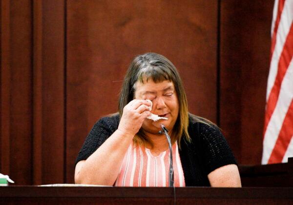 Chandra Murphey wipes her tears while giving her testimony about her mother in law, Charlene Murphey, during the trial of RaDonda Vaught, at Justice A.A. Birch Building in Nashville, Tenn., on March 22, 2022. (Stephanie Amador/The Tennessean via AP)