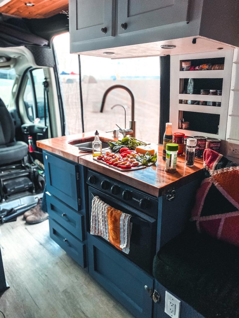 Inside Trent and Allie's self-converted van. (Courtesy of <a href="https://www.youtube.com/channel/UCwh2SF7McSUf1GVFVk0nP8w">Trent and Allie</a>)
