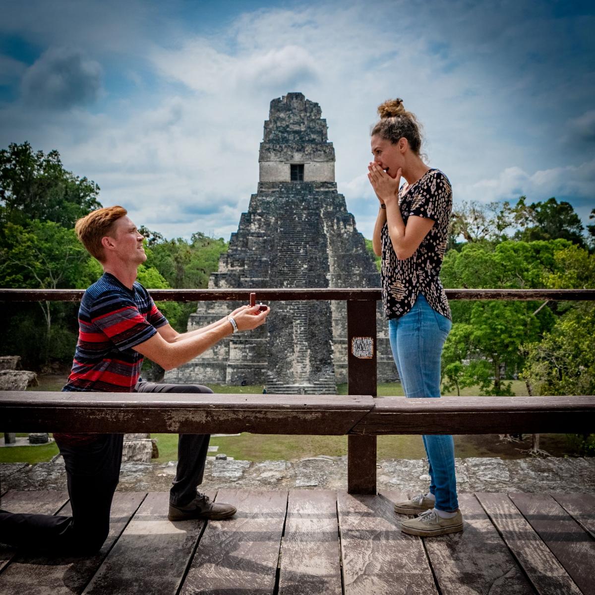 Trent proposes to Allie on top of a pyramid in Tikal, one of the largest Mayan ruins in a remote jungle in northern Guatemala. (Courtesy of <a href="https://www.youtube.com/channel/UCwh2SF7McSUf1GVFVk0nP8w">Trent and Allie</a>)