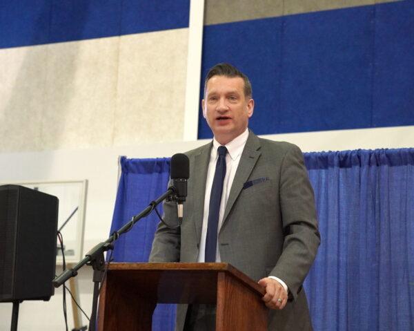 Michael Dewey, head of Evergreen Christian School, speaks at the school’s dedication ceremony in Leesburg, Va., on Apr. 23, 2022. (Terri Wu/The Epoch Times)