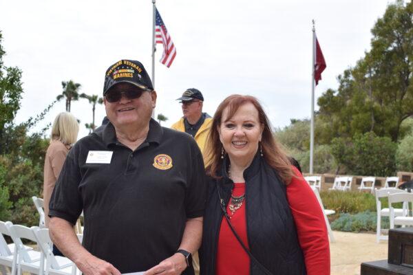 2/4 Association of Marines Reunion co-host Becky Valdez (R) and Sgt. Frank Valdez pose for a picture during the 2022 Bastard Awards ceremony at Sempre Fi Park in San Clemente, Calif., on March 31, 2022. (Brandon Drey/The Epoch Times)