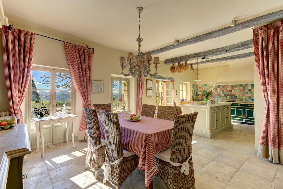 The country kitchen continues the warm, welcoming, and practical feel the designers intended. The villa has every luxury and convenience, without being ostentatious. The guest house also has its own kitchen. (Courtesy of the villa owners & Carlton International)