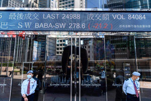 Stock activity of the Alibaba Group Holding Ltd. is displayed outside the Exchange Square towers in Hong Kong on Nov. 4, 2020. (ANTHONY WALLACE/AFP via Getty Images)