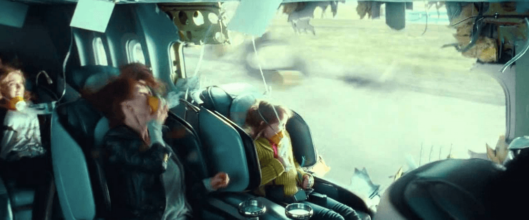 Jen Summers (Julianne Moore) uses oxygen mask when the side of the plane blows out, in "Non-Stop." (Myles Aronowitz/Universal Pictures)