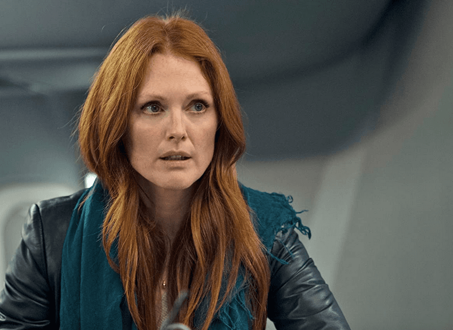 Jen Summers (Julianne Moore) helps unlock a hijacker's phone, unintentionally starting a 30-minute timer for a bomb, in "Non-Stop." (Myles Aronowitz/Universal Pictures)