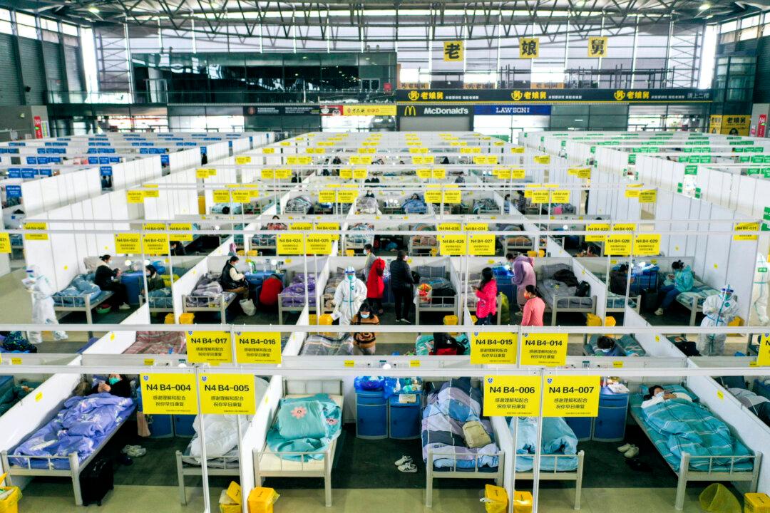 Shanghai Isolates Residents for Being in a WeChat Group with COVID-19 Cases
