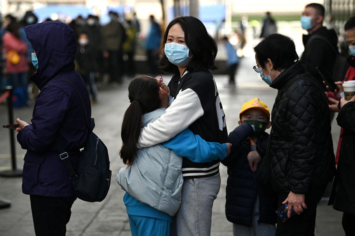 People queue to be tested for the COVID-19 coronavirus in Beijing on March 14, 2022, amid a record surge of infections across China. (Noel Celis/AFP via Getty Images)