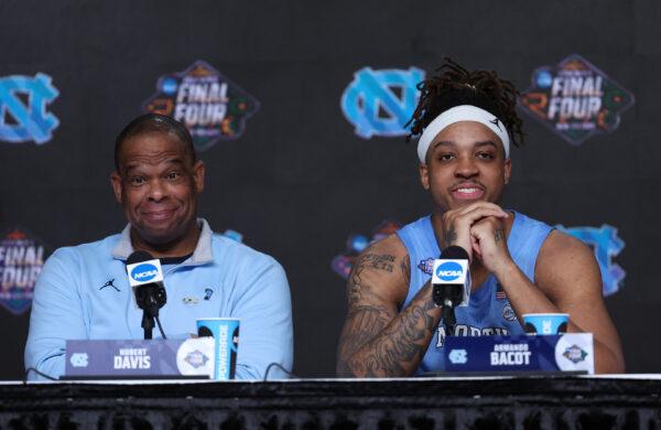 Head coach Hubert Davis and Armando Bacot #5 of the North Carolina Tar Heels talk to the press after defeating the Duke Blue Devils 81–77 in the 2022 NCAA Men's Basketball Tournament Final Four semifinal at Caesars Superdome, in New Orleans, on April 2, 2022. (Jamie Squire/Getty Images)