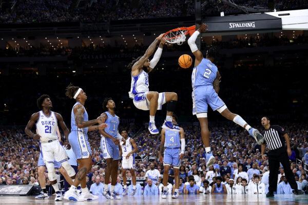 Theo John #12 of the Duke Blue Devils dunks the ball in the first half of the game against the North Carolina Tar Heels during the 2022 NCAA Men's Basketball Tournament Final Four semifinal at Caesars Superdome, in New Orleans, on April 2, 2022. (Tom Pennington/Getty Images)