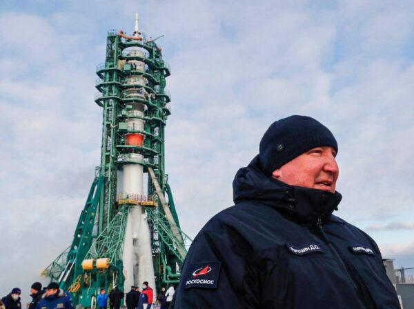 Director General of Roscosmos Dmitry Rogozin stands in front of the Soyuz MS-20 spacecraft at the Baikonur Cosmodrome, Kazakhstan, on Dec. 8, 2021. (Shamil Zhumatov/Pool/Reuters)