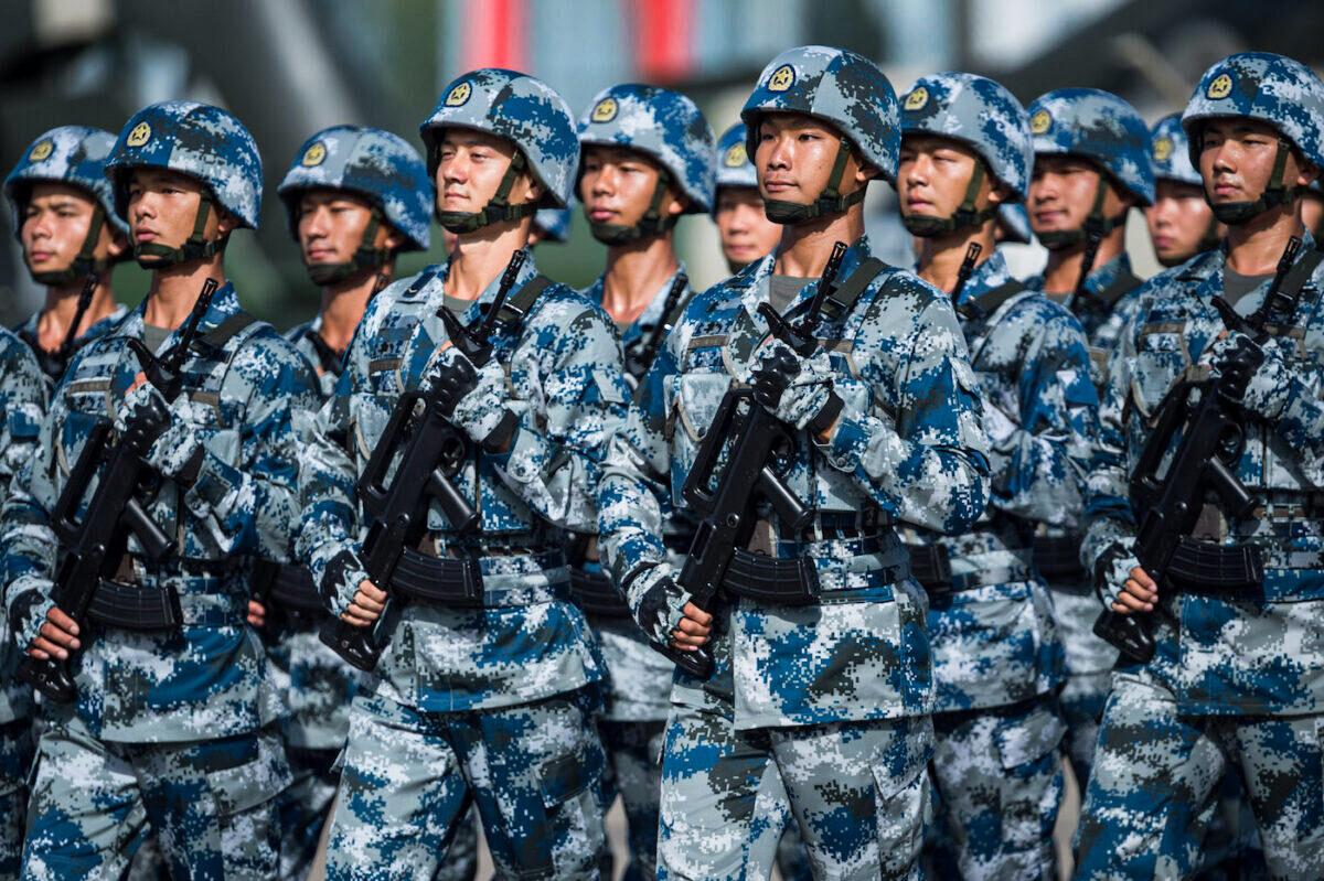 Soldiers in China's People's Liberation Army at the Shek Kong barracks—part of the Hong Kong garrison—on June 30, 2017. (Dale De La Rey/AFP via Getty Images)