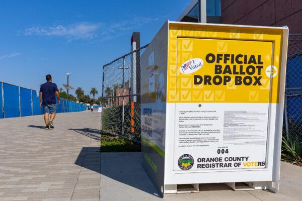 The County of Orange, Calif., has voting ballot boxes available to local citizens as they walk toward government buildings in Santa Ana, Calif., on Sept. 18, 2020. (John Fredricks/The Epoch Times)