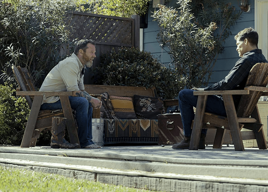 Rusty Jennings (Kiefer Sutherland, L) interviewing James Harper, ex-Navy, ex-Army (Chris Pine), for a job as an independent contractor utilizing military operator skills, in "The Contractor." (Paramount Pictures)