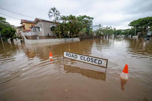 A road closed sign in a flooded Torwood Street, Auchenflower in Brisbane, Australia, on March 3, 2022. (Peter Wallis/Getty Images)
