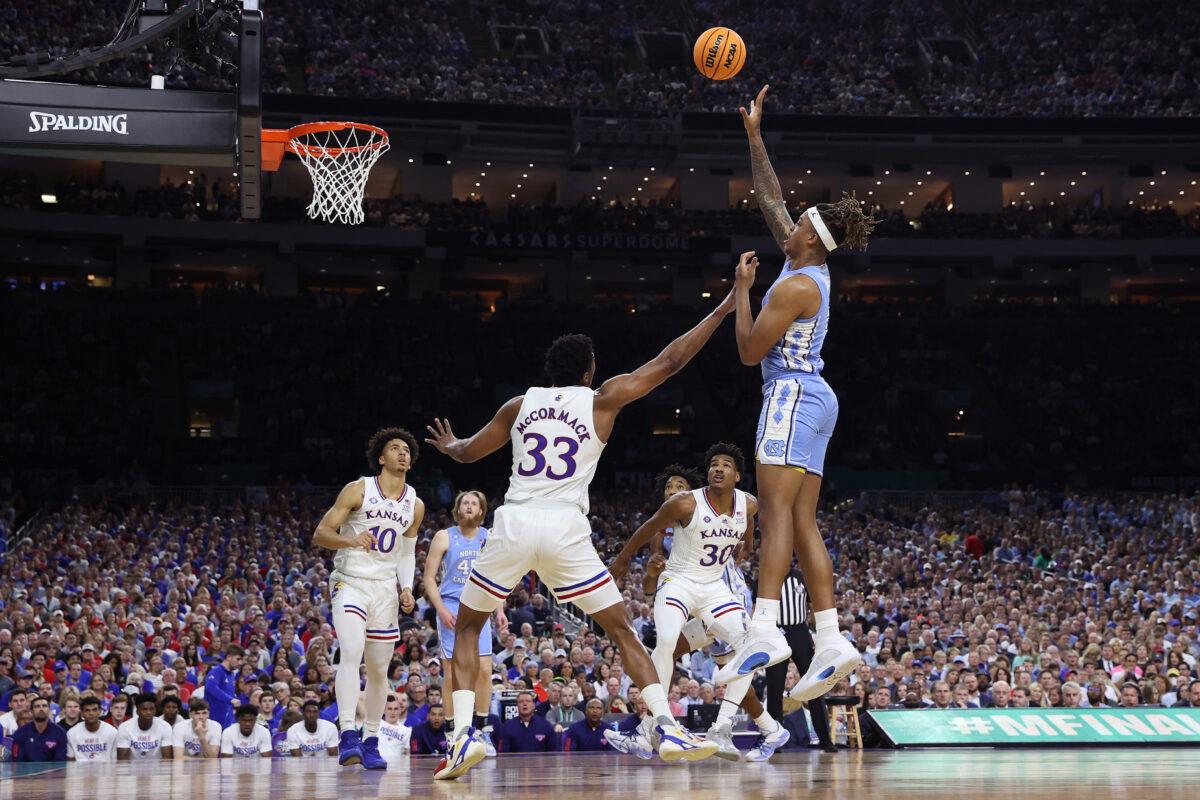 Armando Bacot #5 of the North Carolina Tar Heels shoots the ball as David McCormack #33 of the Kansas Jayhawks defends in the first half of the game during the 2022 NCAA Men's Basketball Tournament National Championship at Caesars Superdome, in New Orleans, on April 4, 2022. (Tom Pennington/Getty Images)