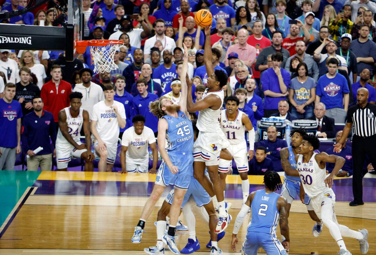 David McCormack #33 of the Kansas Jayhawks shoots the ball over Brady Manek #45 of the North Carolina Tar Heels in the second half of the game during the 2022 NCAA Men's Basketball Tournament National Championship at Caesars Superdome, in New Orleans, on April 4, 2022. (Chris Graythen/Getty Images)