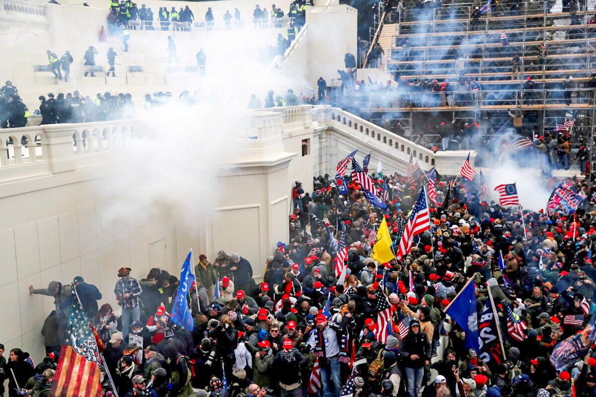 Police release tear gas into a crowd of demonstrators during clashes outside the U.S. Capitol in Washington on Jan. 6, 2021. (Shannon Stapleton/Reuters)