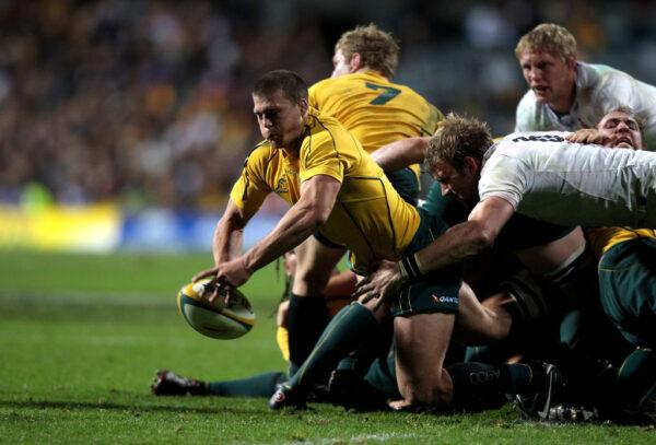 Luke Burgess of the Wallabies passes the ball during the Cook Cup Test match between the Wallabies and England at Subiaco Oval in Perth, Australia, on June 12, 2010. (Photo by David Rogers/Getty Images)