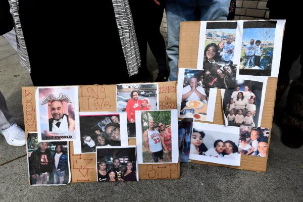 Photographs of De’Vasia Turner are on display as Penelope Scott speaks to the media during an interview at the corner of 10th and K street in Sacramento, Calif., on April 4, 2022. (Jose Carlos Fajardo/Bay Area News Group via AP)