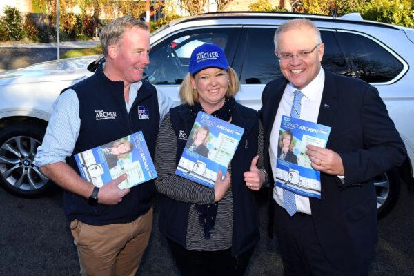 Australian Prime Minister Scott Morrison (R) poses for a photograph with Tasmanian Premier Will Hodgman (L) and candidate for Bass Bridget Archer (C) at Norwood Primary School on May 18, 2019 in Launceston, Australia. (Photo by Mick Tsikas - Pool/Getty Images)