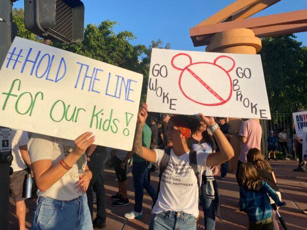 Protestors rally in opposition to The Walt Disney Company's stance against a recently passed Florida law outside of the company's headquarters in Burbank, Calif., on April 6, 2022. (Jill McLaughlin/The Epoch Times)