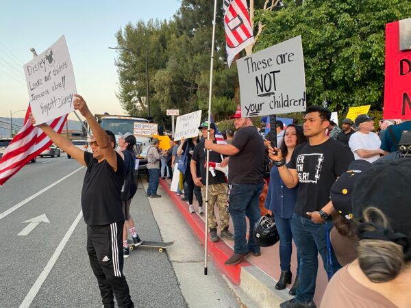 About 150 people attended a rally in opposition to The Walt Disney Company's stance against a  Florida law that prohibits schools from teaching their youngest students about sexual orientation and gender identity outside of Disney's headquarters in Burbank, Calif., on April 6, 2022. (Jill McLaughlin/The Epoch Times)