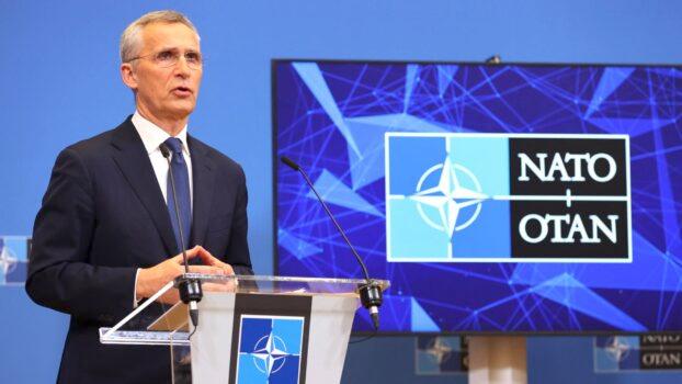 NATO Secretary General Jens Stoltenberg gestures as he addresses media representatives at a press conference following a meeting of NATO foreign ministers at NATO Headquarters in Brussels, Belgium, on April 7, 2022. (François Walschaerts/AFP via Getty Images)