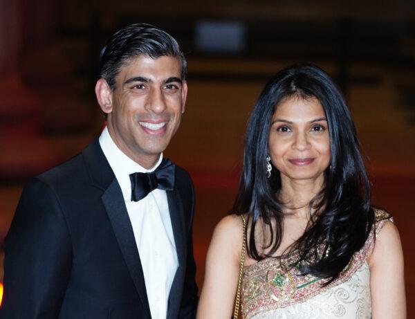 Rishi Sunak, then-chancellor of the Exchequer, and his wife Akshata Murty attend a reception to celebrate the British Asian Trust at the British Museum, in London, on Feb. 9, 2022. (Ian West/PA Media)