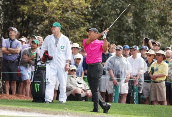 Tiger Woods plays his shot on the first hole during the first round of the Masters at Augusta National Golf Club in Augusta, Ga., on April 7, 2022. (Jamie Squire/Getty Images)
