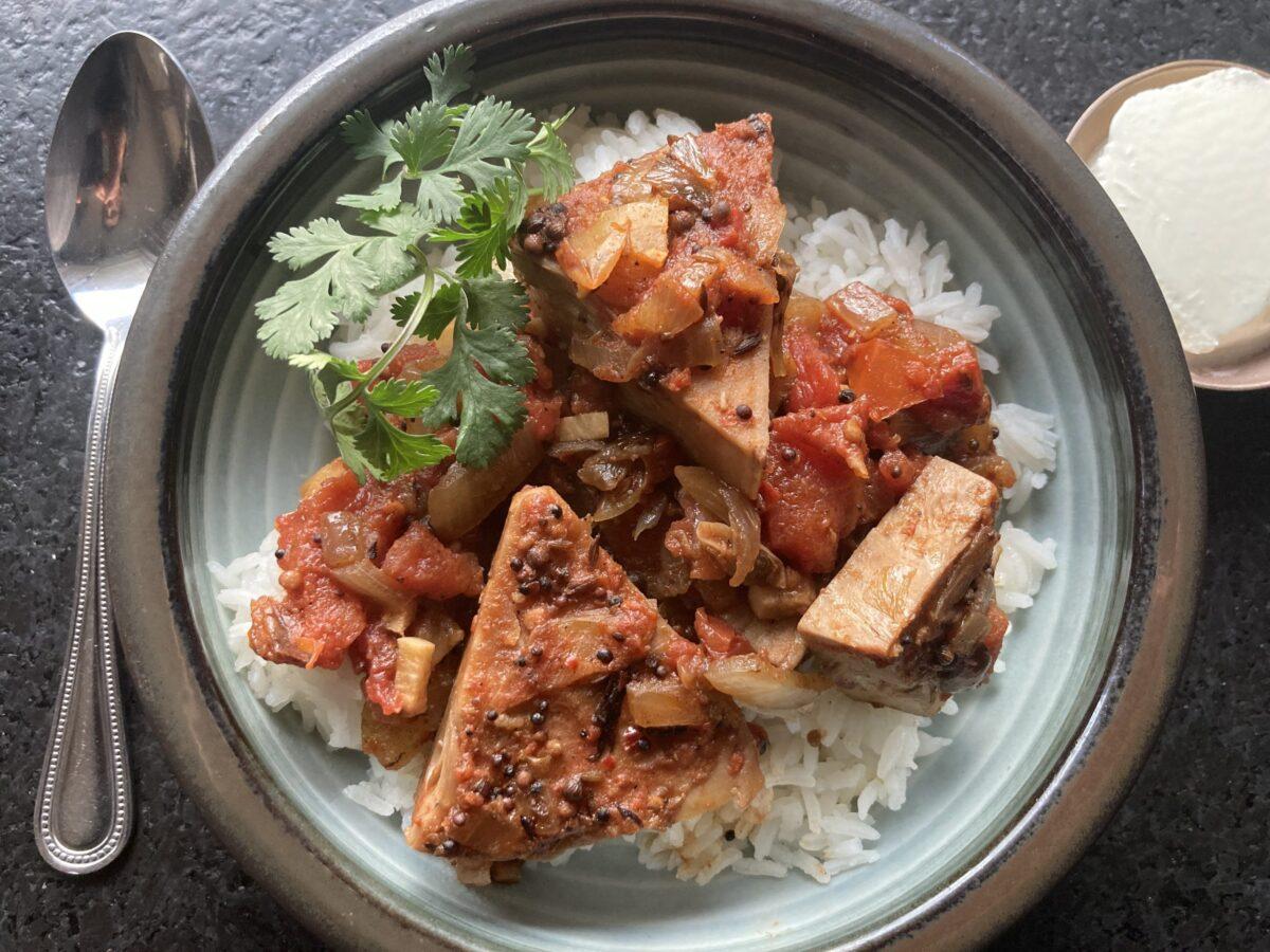 This Indian-style curry smothers fried jackfruit in a rich tomato gravy. (Ari LeVaux)