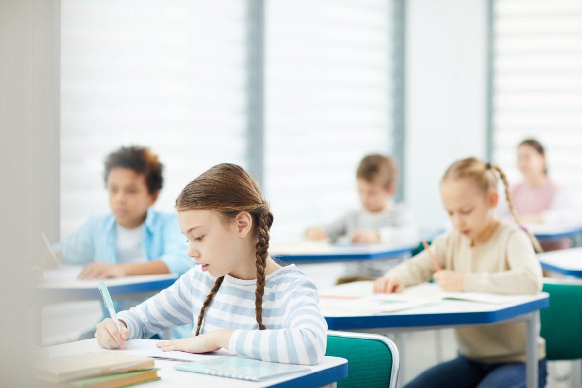 Students do their work in a classroom. Parents have a right to raise questions about what their children are learning in school. (AnnaStills/Shutterstock)