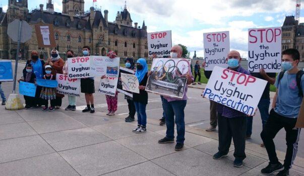 Protesters rally against the 2022 Beijing Winter Olympics at Parliament Hill in Ottawa on June 23, 2021. (NTD Television)
