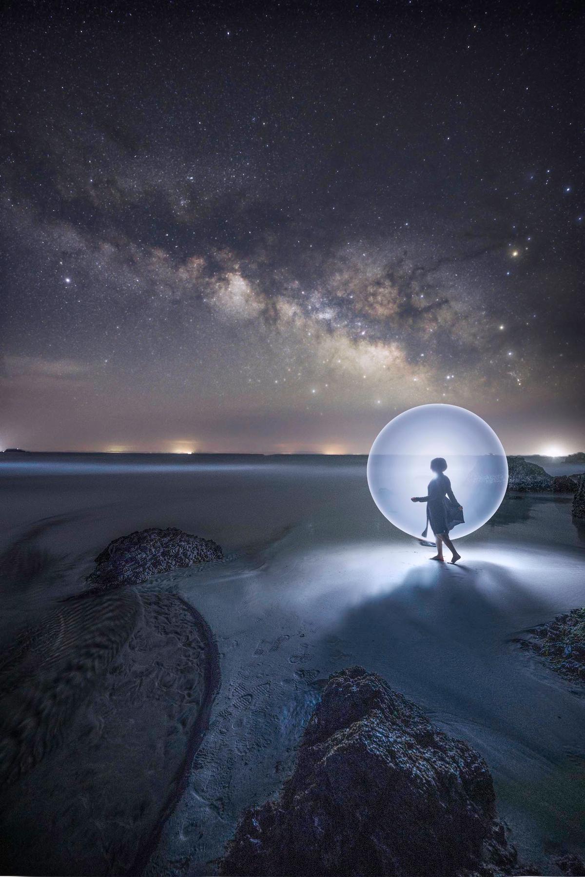 "Milky Way And Circle" by Mituhiro Okabe, Japan. "April on the coast of Japan. I drew the foreground with light paint against the background of the Milky Way." (© Mituhiro Okabe, Japan, 3rd Place, National Awards, Creative, 2022 Sony World Photography Awards)