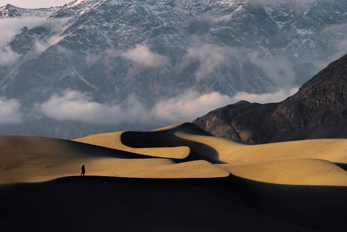 "Golden Snake" by  Yawar Abbas, Pakistan; "In the light from this spectacular sunset the cold desert at Skardu looks like a Golden Snake." ( © Yawar Abbas, Pakistan, Winner, National Awards, Travel, 2022 Sony World Photography Awards_