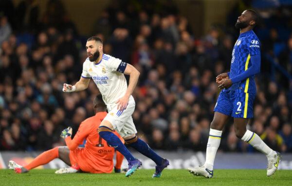 Karim Benzema of Real Madrid celebrates after scoring their team's third goal and their hat trick during the UEFA Champions League Quarter Final Leg One match between Chelsea FC and Real Madrid at Stamford Bridge, in London, on April 6, 2022. (Mike Hewitt/Getty Images)