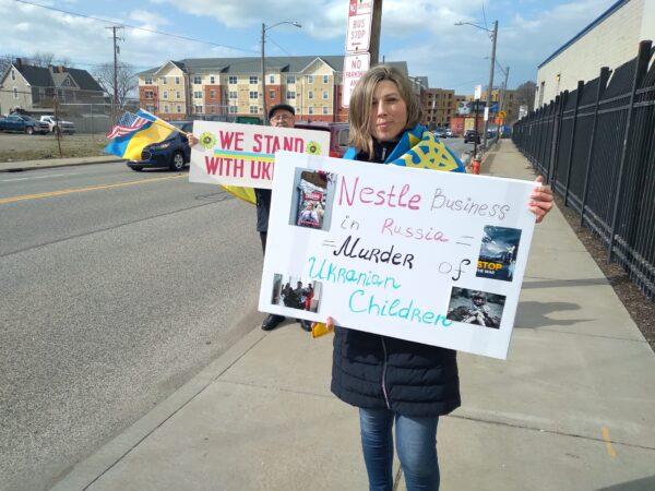 Helen Galyna of Cleveland was among about 30 people who protested at the Cleveland Nestle plant on April 7. Galyna is the president of the Cleveland Maidan Association, a nonprofit organization that has supported Ukraine since 2014. (Michael Sakal/The Epoch Times)