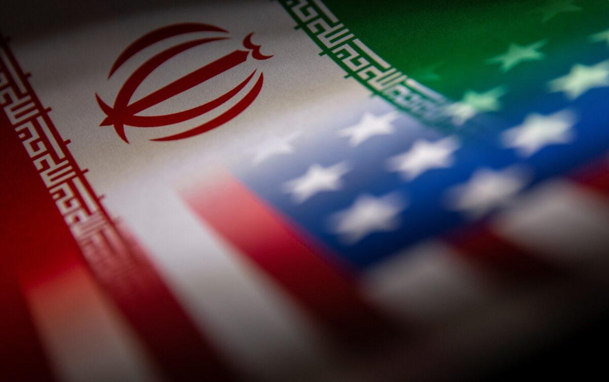 Iranian and U.S. flags printed on paper in this illustration taken on Jan. 27, 2022. (Dado Ruvic/Reuters)