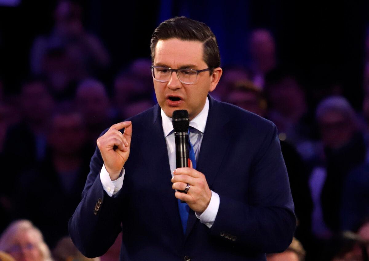 Federal Conservative leadership candidate Pierre Poilievre speaks at a rally in Ottawa on March 31, 2022. (Patrick Doyle/The Canadian Press)