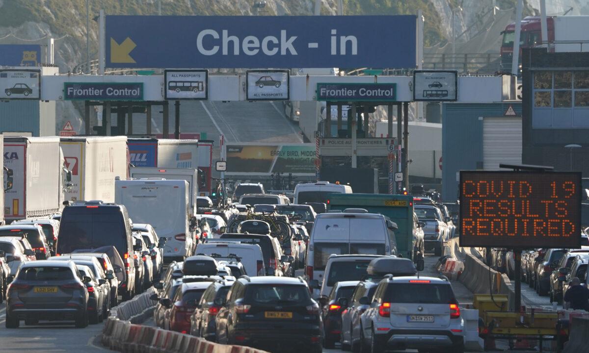 Cars wait to check in at the Port of Dover in Kent, England, on April 9, 2022. (Gareth Fuller/PA Media)