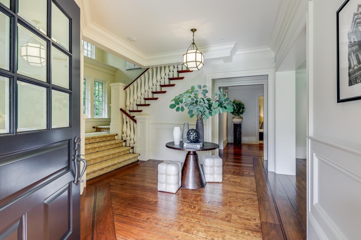 Entering the main foyer, the rich decor and craftsmanship of the main residence are striking. The original architecture and materials have been painstakingly restored, while the latest conveniences have been added. (Courtesy of Jason Wells Photography and Golden Gate Creative/Tracy McLaughlin)