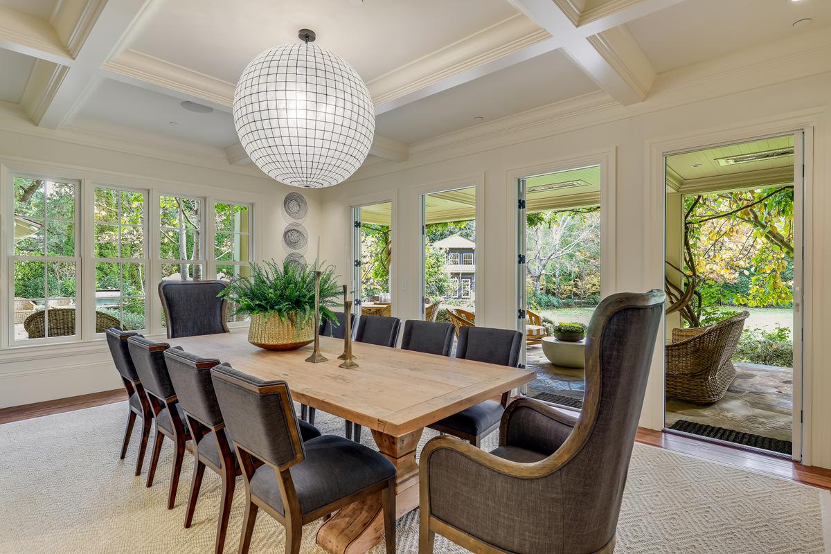  A formal dining room makes great use of ambient light and connects the residential wing to the outside terraces, the pool, and the gardens. (Courtesy of Jason Wells Photography and Golden Gate Creative/Tracy McLaughlin)