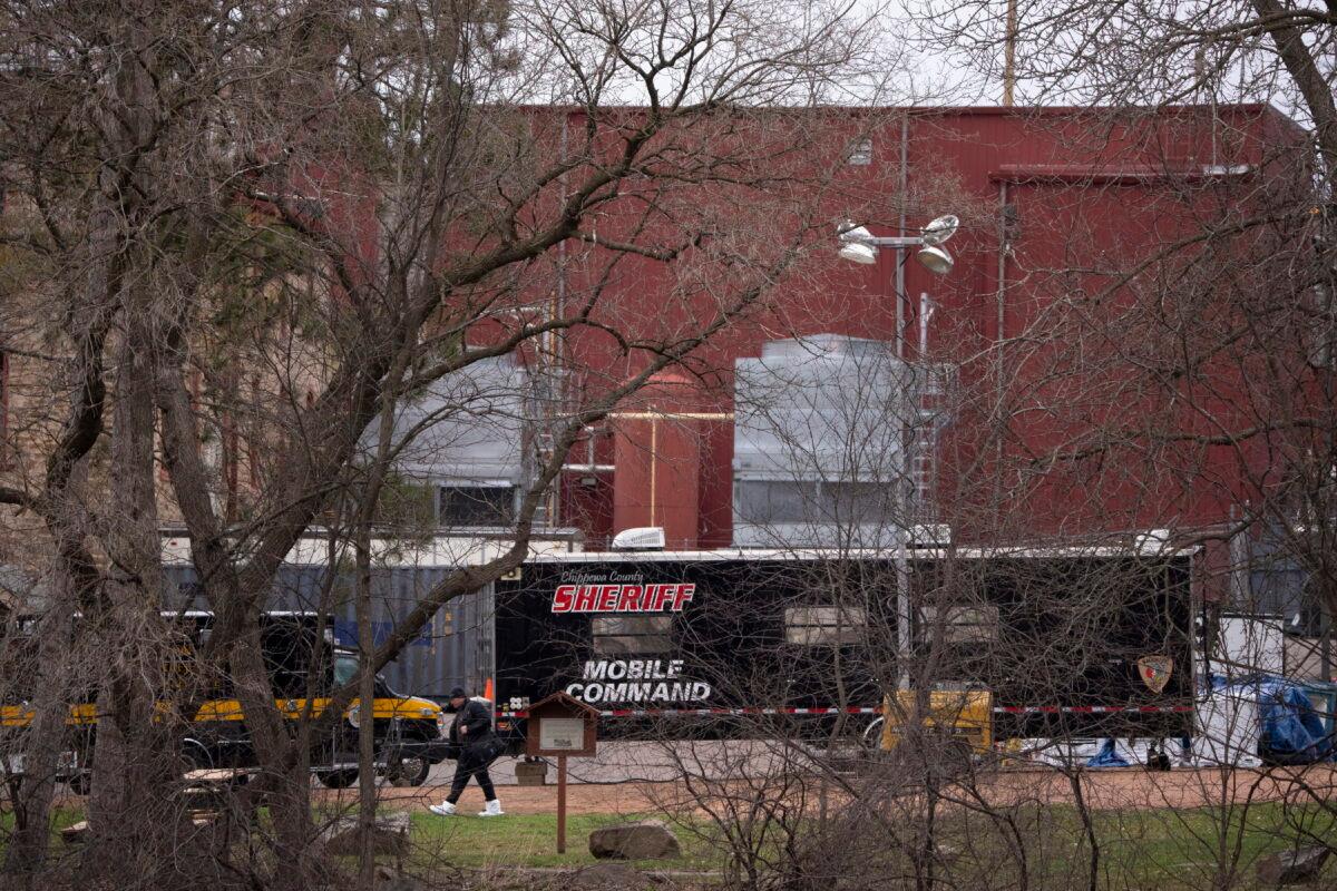 The Chippewa County Sheriff set up a mobile command center in the parking lot of the Leinenkugel's brewery as they process the scene where 10 year-old Iliana "Lily" Peters was found dead in Chippewa Falls, Wis., on April 25, 2022. (Jeff Wheeler/Star Tribune via AP)